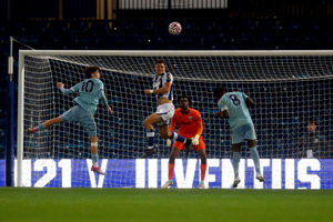Albion defender Evan Humphries rises highest to head clear in the win over Juventus. (Photo by Adam Fradgley/West Bromwich Albion FC via Getty Images)