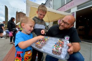 James Hughes of Pretty Puds with Freddie Nutt, 10, and Stanley Nutt, four