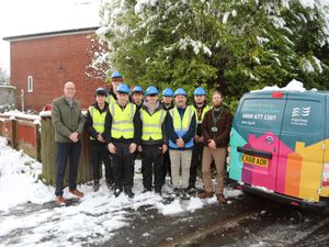 Outside the home in Arleston, Wellington. 

Left to right, David Hall, Wrekin Housing Group, students from Telford College along with Tutor Gary Pitchford and Marcus Ayling from Marches Energy Agency.