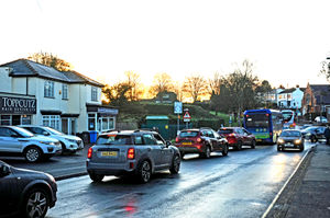 Traffic queues at school picking-up time outside the site of the proposed supermarket