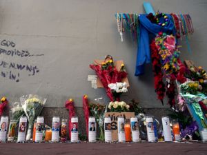 Supporting image for story: New Orleans mourns truck attack victims with tears and dance