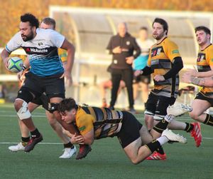 Spencer Latham puts in a tackle for Stafford. Pic: Stafford RFC