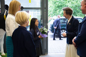The Princess Royal is presented with flowers 