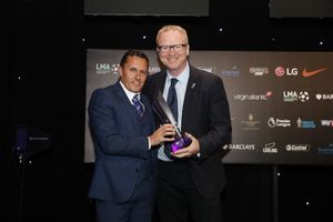 Paul Hurst is handed his award by Alex McLeish