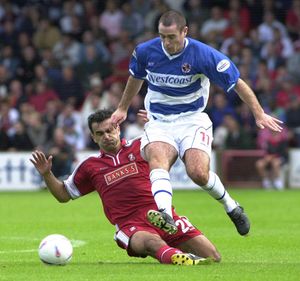 Roberto Martinez takes on scorer Andy Hughes at Bescot.