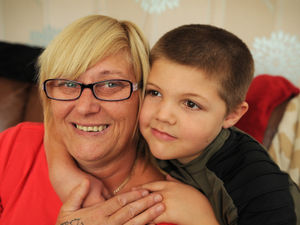 Supporting image for story: Little Owen saves grandmother's life after she has seizure