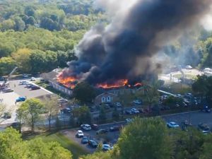 Supporting image for story: Two dead and eight injured in shooting and fire at Michigan church, say police