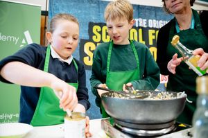 The Green Peppers team, pupils Elsa Tipton and George Coales with teacher Alice Evans 