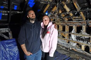 Emma and Jon Logan in the burnt out loft.