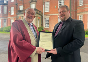 Dr Neville Brown was presented with an official certificate acknowledging an Early Day Motion tabled in his honour at the House of Commons by Lichfield MP Dave Robertson.