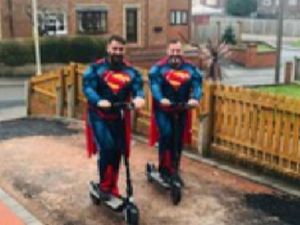 Supporting image for story: Superman-dressed dad to complete 210-mile trek to raise money for terminally ill wife