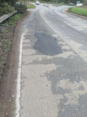 Pothole repair work later took place at the junction of the A495/A528 in Ellesmere. Picture: Rob McBride
