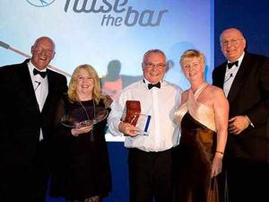 Supporting image for story: Duo celebrate franchise award