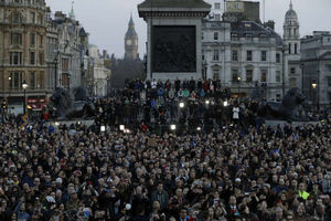 The square was packed as people listened to speeches and left tributes