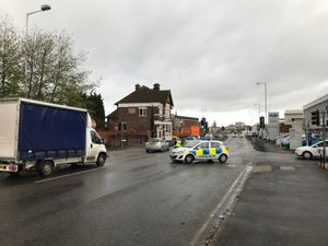 Police blocking of the road and directing traffic