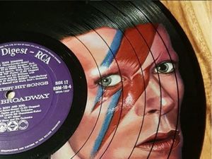 Supporting image for story: Artist creates stunning portraits with coloured pencils on second-hand vinyls