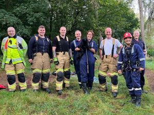 The rescue team with Trixie. Photo: Shropshire Fire and Rescue Service.