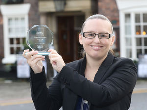 Supporting image for story: Welshpool woman receives award for roving hotels role