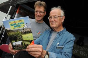 Jake Berriman and David Edwards read a booklet on the new walking trail along the Heart of Wales Railway Line