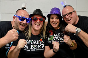 Dandy and Sarah Burden with Donna Briscoe and Shaun Ridding celebrate the return of the Grand Slam of Darts.