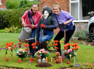 Organisers Jo Knight and Gemma Russell with the Monty Don scarecrow