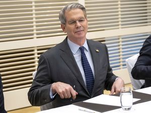 Scott Bessent seated at a desk