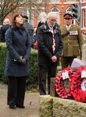 Powys County Council Chief Executive Emma Palmer and Dave Vaughan, Royal British Legion Club Chairman at the cenotaph. Pic by Andy Compton