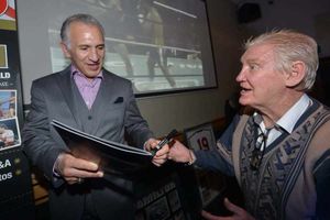 George O'Neill, a 70-year-old former Jnr ABA Champion boxer gets his programme signed by Ray
