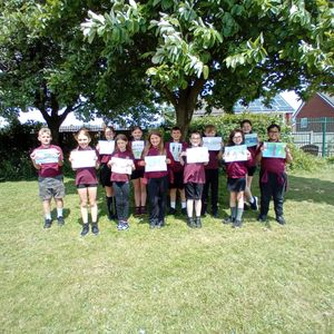Chase Terrace Primary School pupils with their artwork.