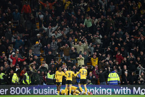 Wolves players celebrate in front of the South Bank (Photo by Dan Istitene/Getty Images)