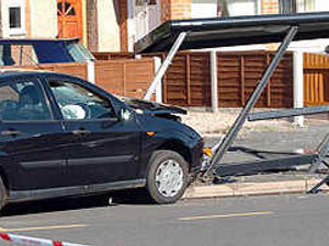 Supporting image for story: Car smashes into bus stop