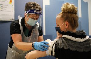 Staff from West Midlands Fire Service receive training from St John Ambulance for the Covid-19 vaccination roll-out