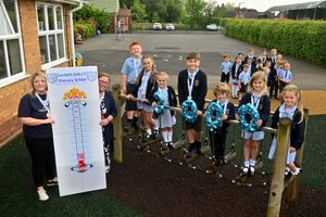 Children at Corbett (VA) CE Primary School, Bobbington celebrating their fundraising efforts