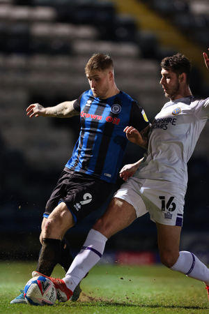 Stephen Humphrys of Rochdale and Brad Walker of Shrewsbury Town.