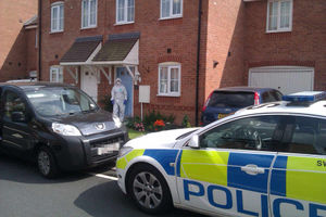 A forensic officer at the house