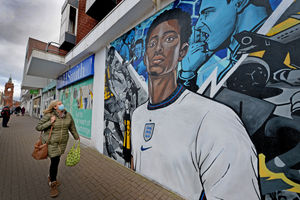 The mural is on the wall of the Ryemarket shopping centre