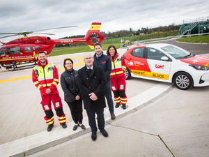 Lord directors Emma Tibbetts, second left, MD Stuart Smith and Greg Jones with the Midlands Air Ambulance team