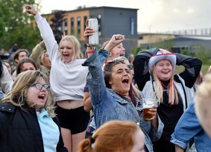 England fans celebrate in Telford Town Park. Photo: Tim Thursfield