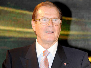 Supporting image for story: Sir Roger Moore and Billy Joel on way to Birmingham