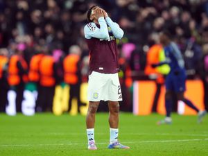 Aston Villa’s Ian Maatsen puts his head in his hands after the final whistle of the UEFA Champions League quarter-final second leg against Paris St Germain at Villa Park
