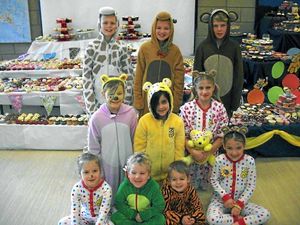 Redhill Primary School, who dressed in their pyjamas, pose in front of the amazing cupcake tower