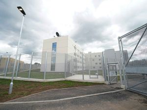 Supporting image for story: Three appear in court charged with prison murder