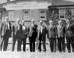 Directors of South Shropshire Farmers Ltd at Craven Arms in 1969. This picture was used as part of a feature on South Shropshire Farmers, which said it was the only Shropshire-based farmers' co-operative of its kind. The caption to the picture was: 'These directors, with Mr F.J. Pete, are Mr T. Price, Mr E.M. Holloway, Mr F.E.T. Hamar, Mr J. Llewellyn Jones, Mr R.E. Morgan, Mr T. Corfield, and Mr G. Jones.' Presumably this reads left to right although it is not stated. The story says in part: 'The 52-year-old society is in the first flight of farmers' co-operatives and serves farmers in Shropshire and Herefordshire and the border districts of neighbouring counties.'