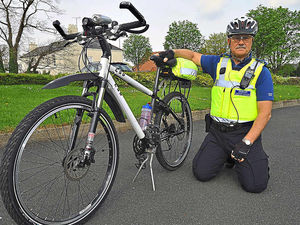 Supporting image for story: Telford's long legs of the law cycle 10,000 miles on beat