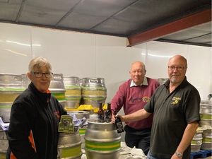 Supporting image for story: Cheers! Volunteers raise a glass after 20,000 pints are sunk to help restore canal 