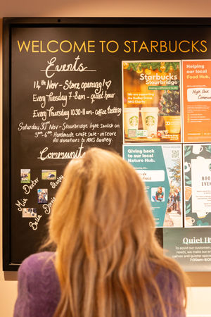 Community and in-store events are showcased on a board at the new coffee shop. Photo: Starbucks