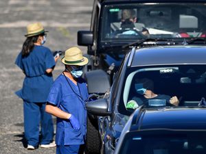 Supporting image for story: New virus infections driven by Omicron soar in Australia