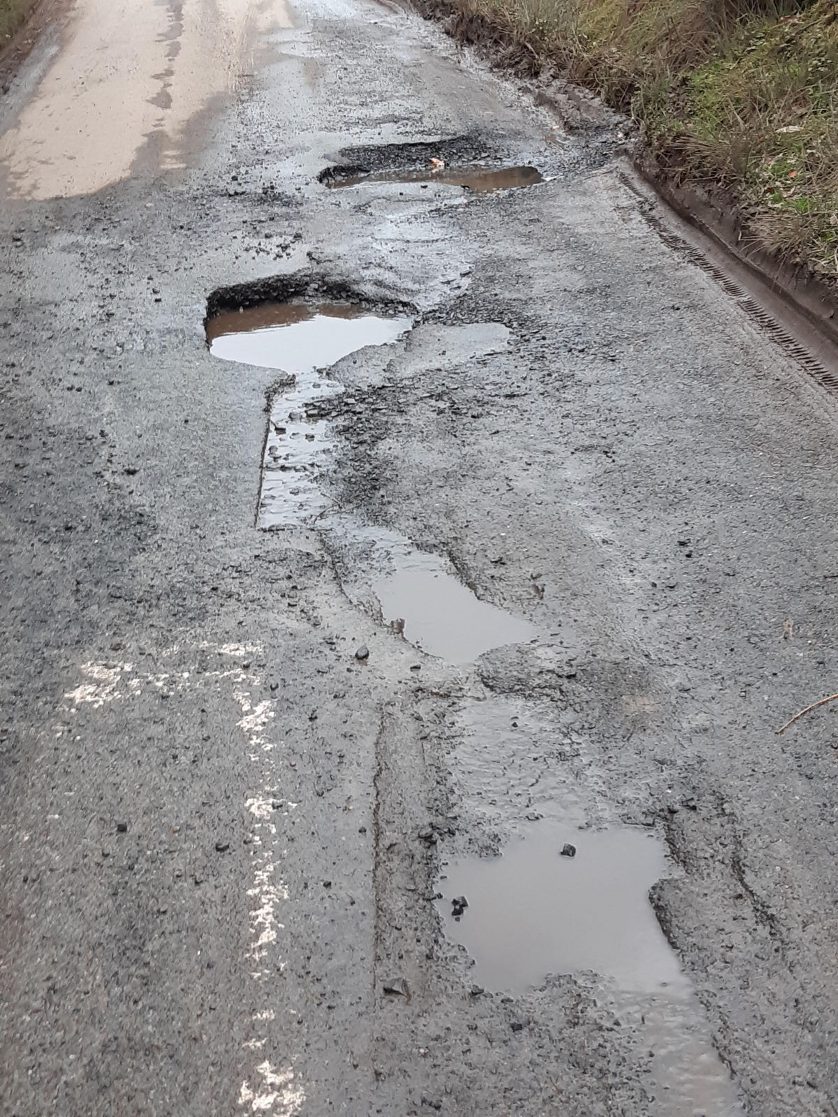 Living in a third world country: Rural Shropshire residents hit out at they huge potholes plaguing their neighbouhood Living in a third world country: Rural Shropshire residents hit out at they huge potholes plaguing their neighbouhood