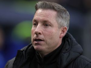 Neil Harris on the touchline
