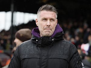 Supporting image for story: Rob Edwards relieved as Wolves survive mud bath at Grimsby to edge FA Cup tie